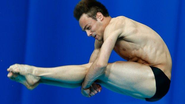 Tom Daley performs a tuck