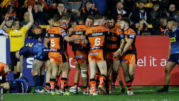 Castleford celebrate a try against Wigan