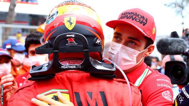 Charles Leclerc congratulates team-mate Carlos Saniz