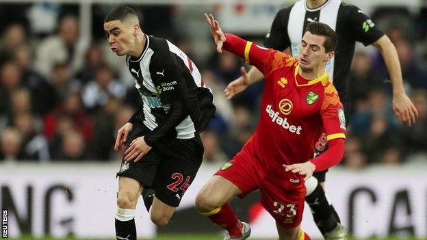 Miguel Almiron and Kenny McLean