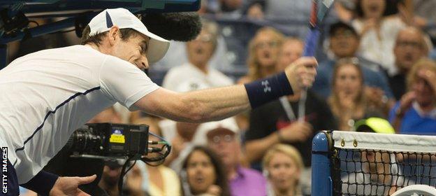 Andy Murray hits the net in frustration