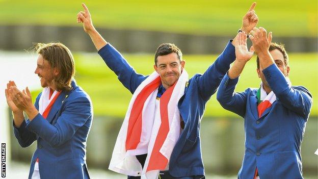 Rory McIlroy (centre) celebrates at the 2018 Ryder Cup, flanked by Europe team-mates Tommy Fleetwood (left) and Francesco Molinari (right)