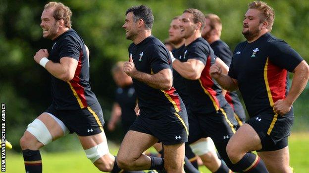 Wales players sprinting in rugby training