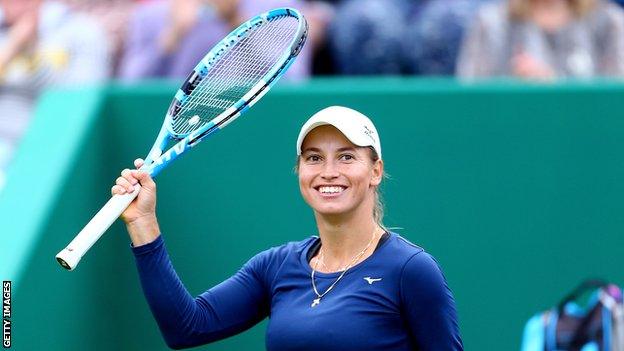 Putintseva waves at the crowd