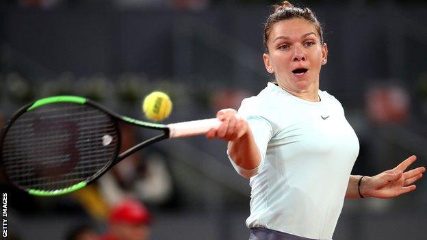 Simona Halep in action against Viktoria Kuzmova at the Madrid Open