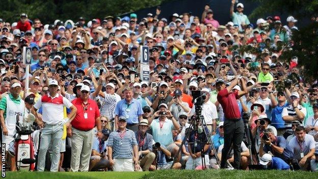 Tiger Woods playing a shot at Bellerive