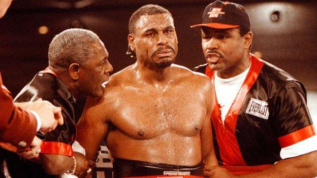 Former world heavyweight champion Oliver McCall in tears during his 1997 bout against Lennox Lewis