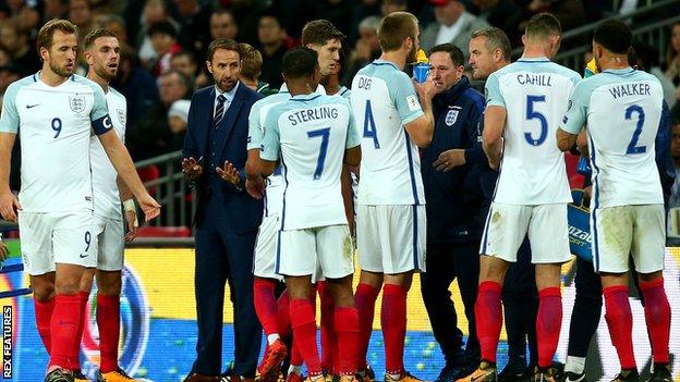 Gareth Southgate talks to his England players