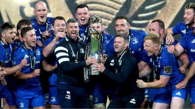 Rob Kearney and Fergus McFadden lift the Pro14 trophy