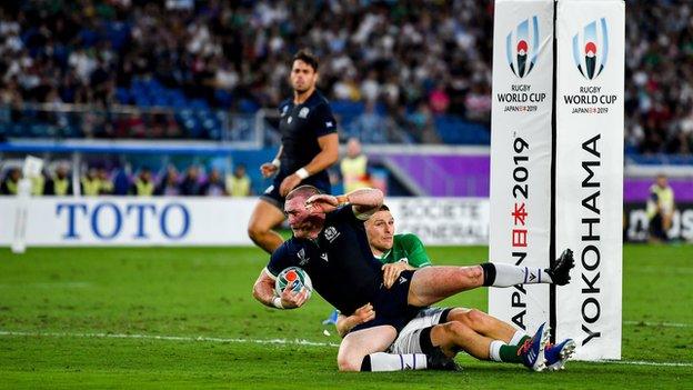 Scotland's Stuart Hogg being tackled by an Ireland player