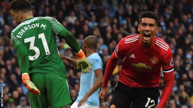 Chris Smalling celebrates scoring Manchester United's winner