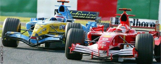 Fernando Alonso and Michael Schumacher tussle at the 2005 Japanese Grand Prix