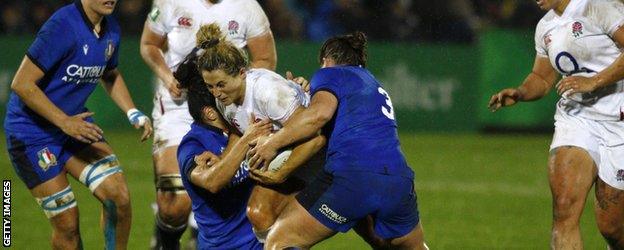 England's Vicky Fleetwood is tackled by Italy's Lucia Gai