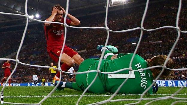 Roma's Cengiz Under is denied by Loris Karius