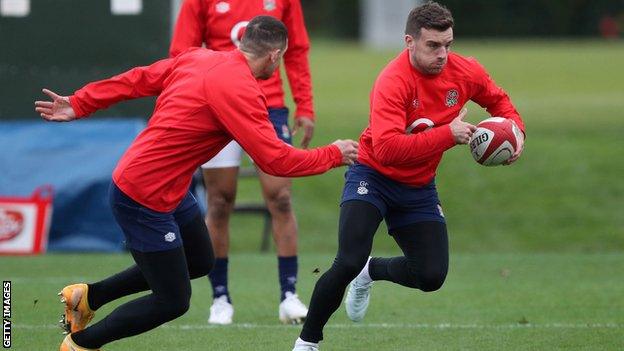 George Ford runs in training