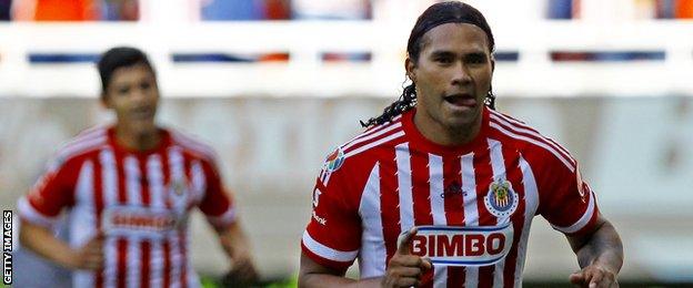 Guadalajara's Carlos Pena celebrates a goal