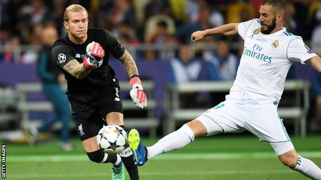 Loris Karius' throw is blocked by Karim Benzema for a Real Madrid goal