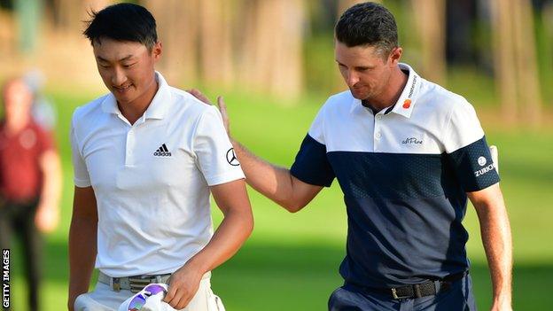 Li Hoatong and Justin Rose