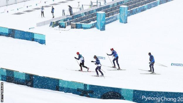 Cross-country skiers get in some training in the snow