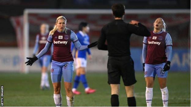 West Ham's Katerina Svitkova is booked by referee Isaac Searle