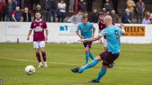 Liam Boyce scores a penalty for Hearts against Linlithgow Rose