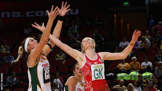 Lenize Potgieter of South Africa and Rosanna Pretorius of Wales compete for the ball