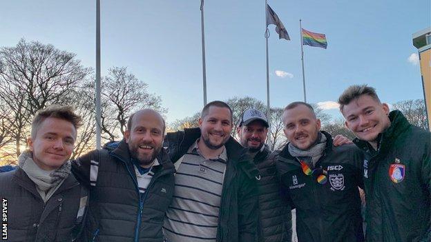 Liam Spivey (far right) with friends in front of the KCOM Stadium