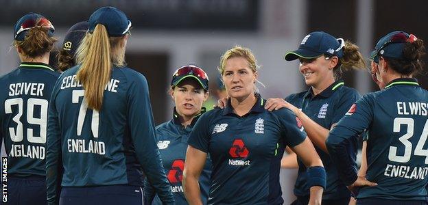 Katherine Brunt celebrates a wicket with teammates