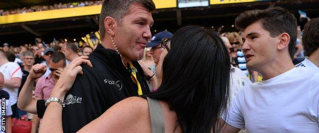 Rob Baxter, Head Coach of Exeter Chiefs celebrates with his wife Jo and son Jack following his side's victory