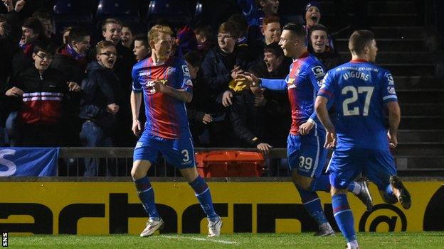 Inverness players celebrate