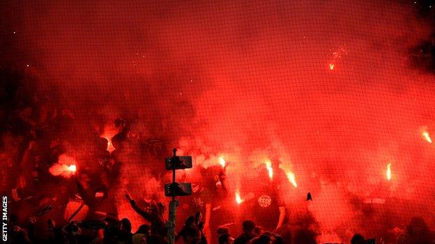 Saint-Etienne fans let off flares