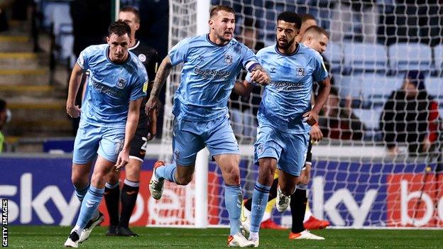 Coventry's Kyle McFadzean celebrates after heading in his second goal of the season