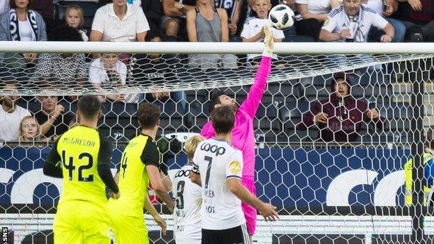 Celtic's Craig Gordon saves a Marius Lundemo header