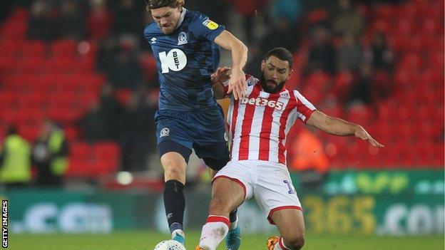 Cameron Carter-Vickers (right) makes a tackle