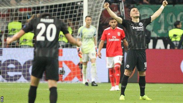 Eintracht Frankfurt players celebrate beating Benfica in the Europa League