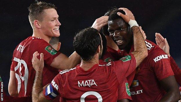 Paul Pogba (right) is congratulated after scoring