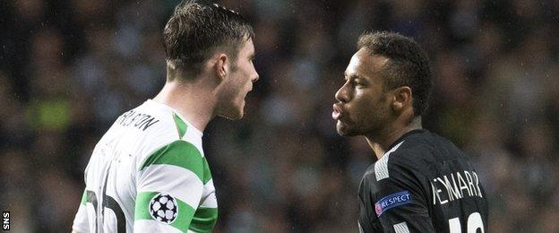 Celtic's Anthony Ralston and PSG's Neymar exchange words