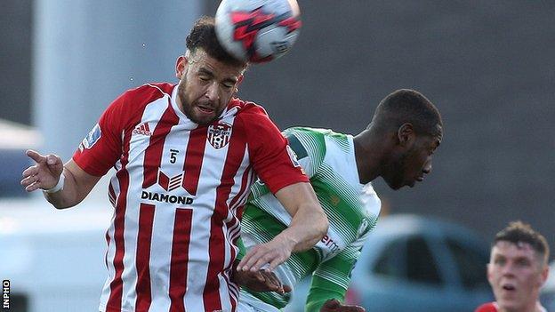 Derry's Darren Cole battles with Shamrock Rovers' Daniel Carr