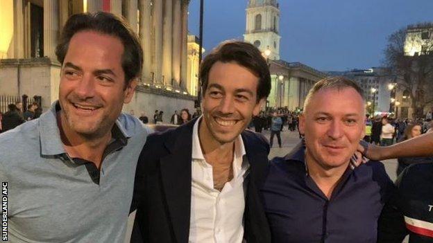 Sunderland owner Stewart Donald (right), executive director Charlie Methven (left) and board member Juan Sartori join the celebrations in London