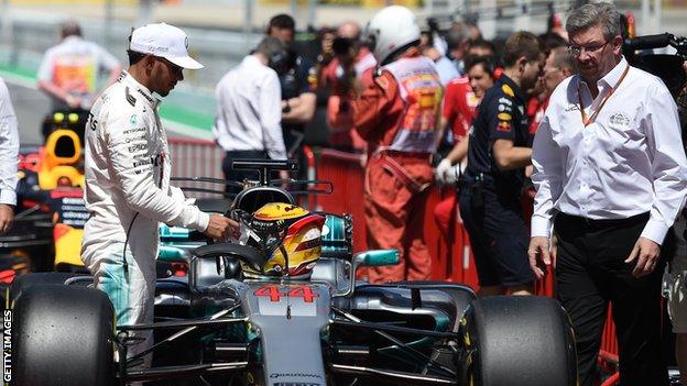 Formula 1 sporting Ross Brawn with Mercedes F1 driver Lewis Hamilton