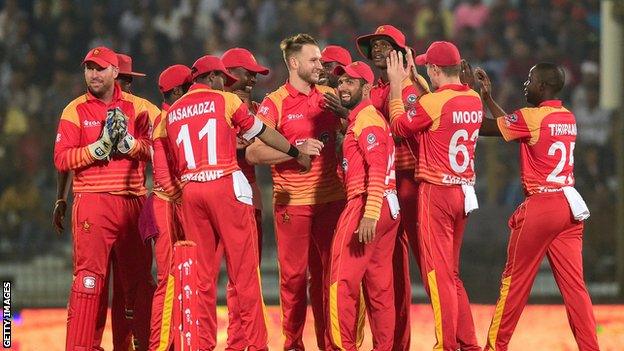 Zimbabwe cricket team celebrate taking a wicket