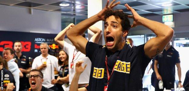 Daniel Ricciardo watches the action as West Coast Eagles play in the AFL Grand Final before final practice