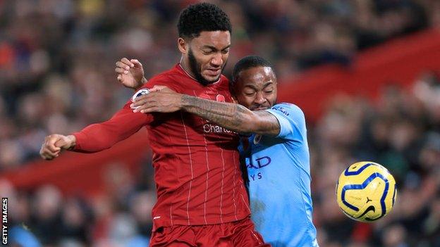 England's Joe Gomez and Raheem Sterling