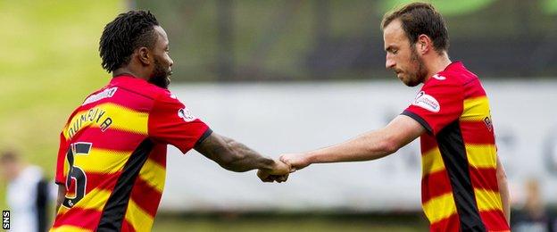 Partick Thistle's Mustapha Dumbuya (left) and Stuart Bannigan