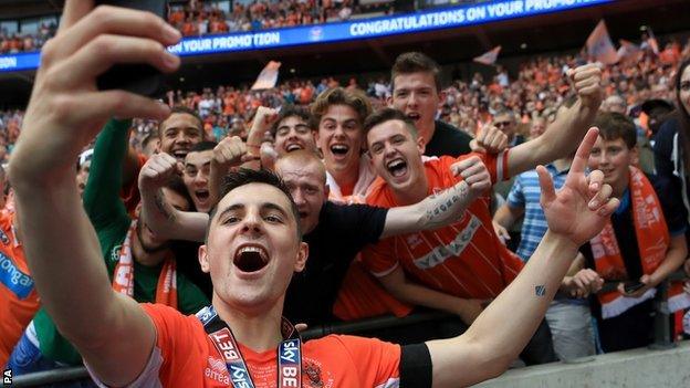 Jordan Flores celebrates promotion as Blackpool player