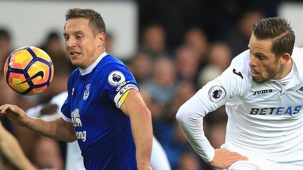 Phil Jagielka and Swansea's Gylfi Sigurdsson compete in November, 2016