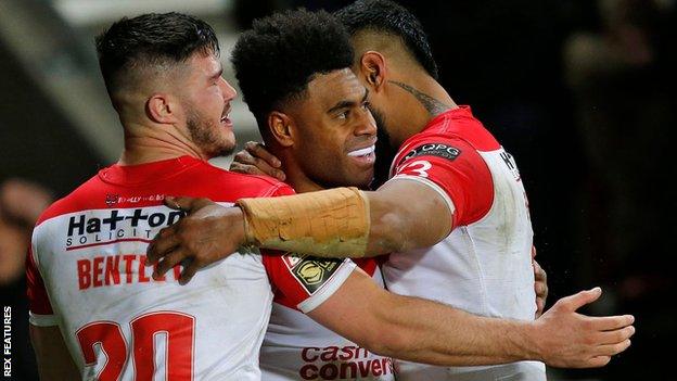 Kevin Naiqama (centre) scored two of St Helens' eight tries during a dominant opening night win against Salford