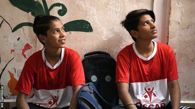 Saini (left) and Prajapati (right) in their football kits