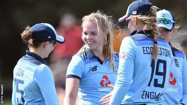 England seamer Freya Davies (centre)