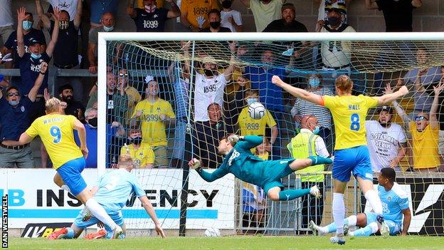 Danny Wright scores his second goal for Torquay